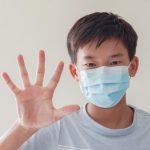 asian-preteen-boy-wearing-medical-face-mask-making-stop-sign-self-quarantine-coronavirus-covid-19-virus-outbreak-epidemic-pandemic_49149-1247